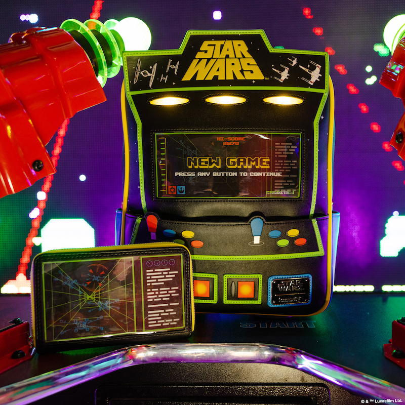 Image of our NYCC 2023 exclusive Star Wars mini backpack that looks like a video game machine from an arcade and matching game-themed wallet